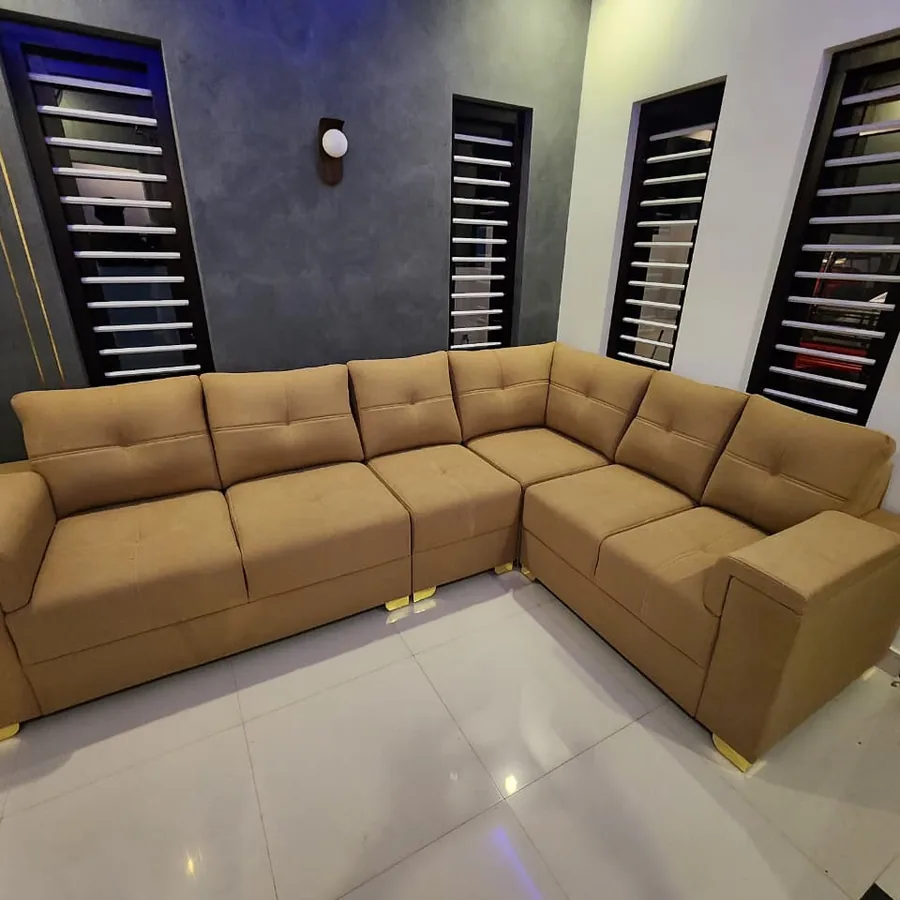 CRAFTOMAX tan L-shape sofa installed in client home
